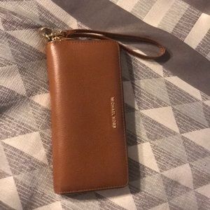 Brown Michael kors wristlet/wallet